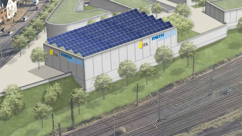 Visualisierung einer Luftaufnahme des Digital Nonwoven Innovation Centers im Innovationsquartier neben den Gleisen des Dürener Bahnhofs